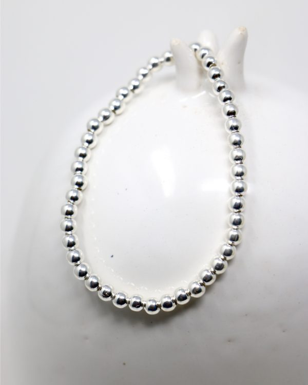 Pulsera bolitas elasticas
