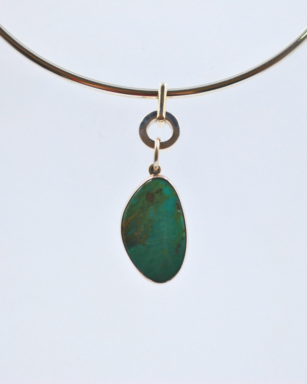 Dije de plata con piedra turquesa