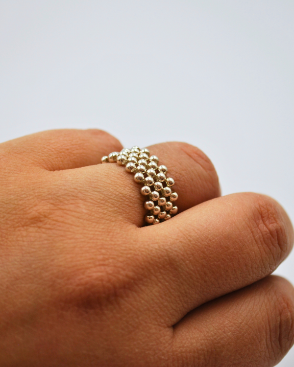 Anillo bolitas elásticas