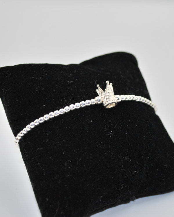 Pulsera elastica de bolitas de plata con una corona picos - Imagen 2