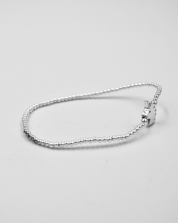 Pulsera elastica de bolitas de plata con unicornio - Imagen 3