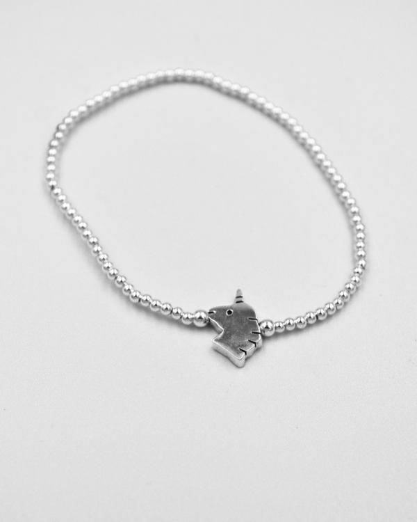Pulsera elastica de bolitas de plata con unicornio - Imagen 4