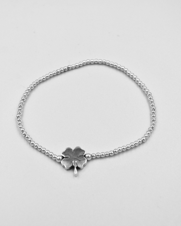 Pulsera elastica de bolitas de plata con trebol - Imagen 2