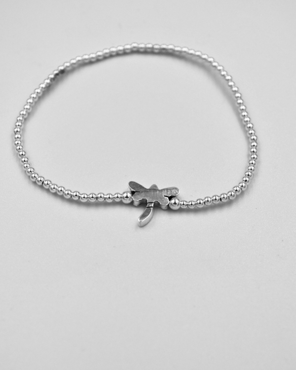 Pulsera elastica de bolitas de plata con libelula