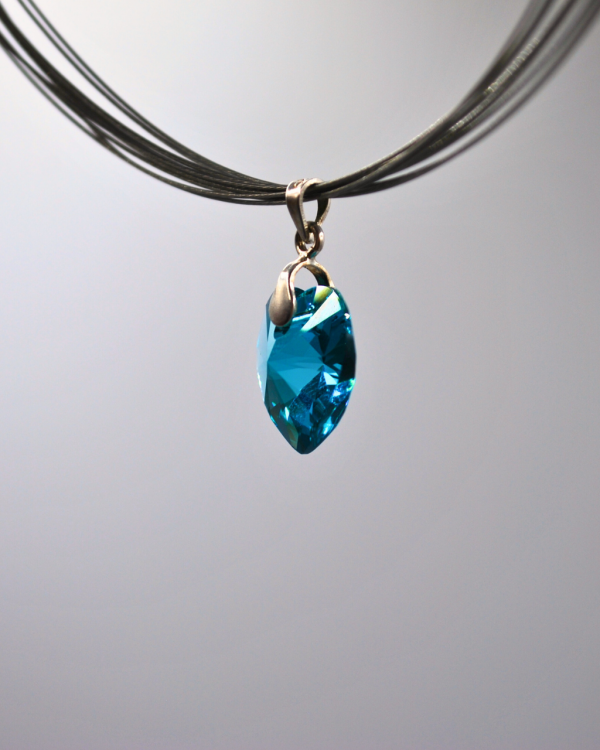 Dije corazón de cristal