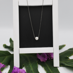 Collar de plata negra con dije esfera de plata