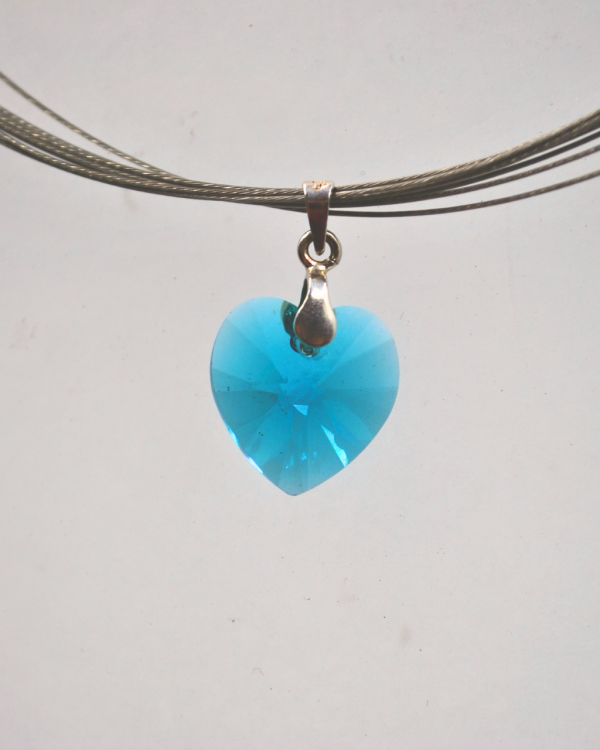 Dije corazón de cristal