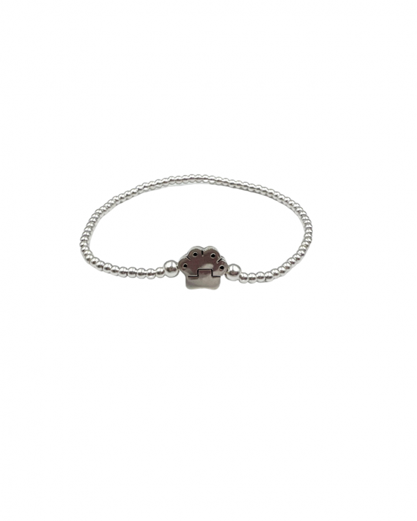 Pulsera elastica de bolitas de plata con huella de perro