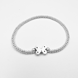 Pulsera elastica de bolitas de plata con mariposa