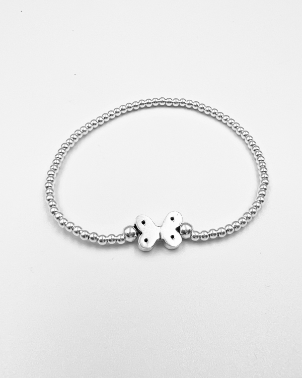 Pulsera elastica de bolitas de plata con mariposa