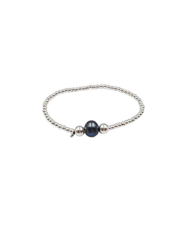 Pulsera elástica con dos esferas de plata y una perla azul en el centro