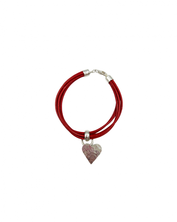Pulsera de caucho con dije de plata en forma de coraazón