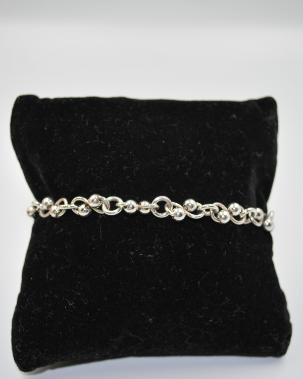 Pulsera de infinitos entrelazados