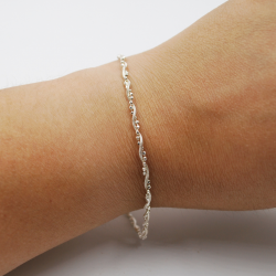 Pulsera torneada con plata lisa